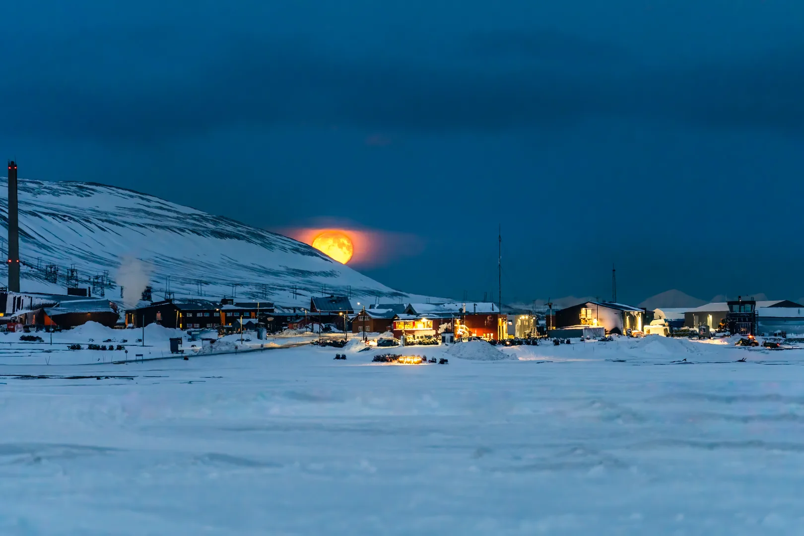 Longyearbyen settlement glowing under the night sky